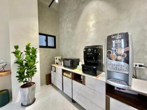 Comodidades para chá e café em 飛行船電梯民宿