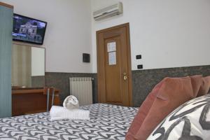 TV a/nebo společenská místnost v ubytování Hotel Ciao