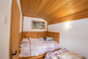 Krevet ili kreveti u jedinici u okviru objekta Planinska kuca Petkovic