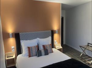 Letto o letti in una camera di Hôtel Chilhar