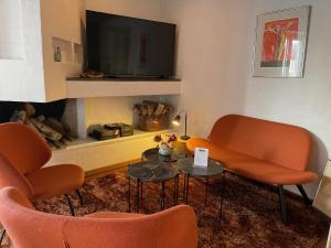 TV a/nebo společenská místnost v ubytování City Hotel Nattergalen