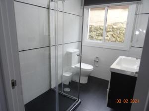 Koupelna v ubytování Apartamentos Casa Mucha + 7 fotografií