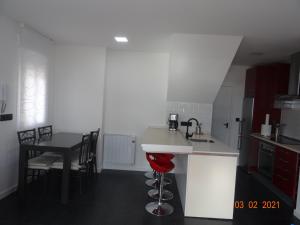 Kuchyň nebo kuchyňský kout v ubytování Apartamentos Casa Mucha