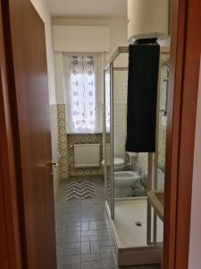 Ванна кімната в Appartamenti Giulia - Palazzo Milano