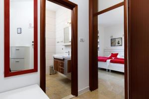 Posteľ alebo postele v izbe v ubytovaní Beach Apartments in Stobrec