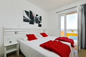 Posteľ alebo postele v izbe v ubytovaní Nice apartment with a sea view + 7 fotografií