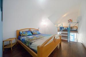Postel nebo postele na pokoji v ubytování Casa Sottorar - Loft Open Space in Corricella