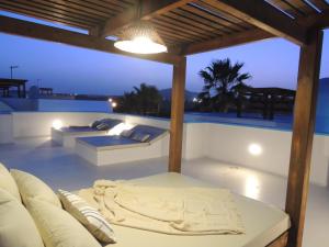 The swimming pool at or close to COZY, Beach House , by MAHBOVILLAS