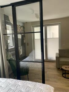 Postel nebo postele na pokoji v ubytování APARTAMENTY PIANO POLNA 28
