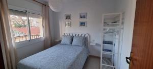 Posteľ alebo postele v izbe v ubytovaní Sa Shei Apartment Tossa de Mar