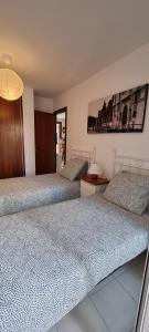 Posteľ alebo postele v izbe v ubytovaní Sa Shei Apartment Tossa de Mar
