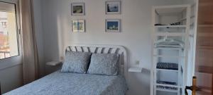 Posteľ alebo postele v izbe v ubytovaní Sa Shei Apartment Tossa de Mar