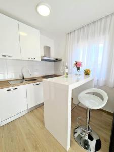 Kuchyň nebo kuchyňský kout v ubytování Apartment Ane 3