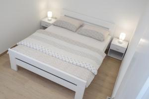 Postel nebo postele na pokoji v ubytování Apartment Ane 3