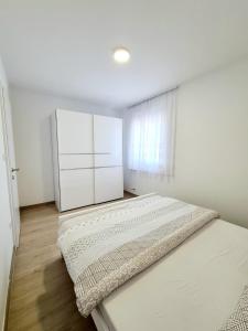 Postel nebo postele na pokoji v ubytování Apartment Ane 3