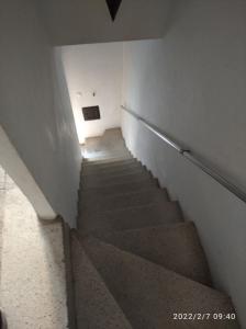 a stairway in a building with a stair case at Vivienda Turística Templo Romano in Córdoba