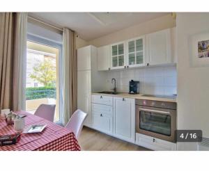 A kitchen or kitchenette at Grand Noble - Confort Appartement 60 m2 - Blagnac