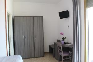 TV a/nebo společenská místnost v ubytování GFH - Hotel Spiaggia D'Oro