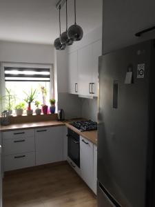 Dapur atau dapur kecil di apartament Ewa