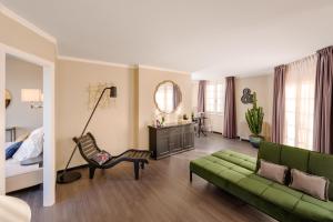 Postel nebo postele na pokoji v ubytování Hotel Mentana, by R Collection Hotels