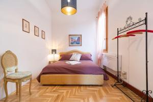 Postel nebo postele na pokoji v ubytování Ca' sull' Acqua