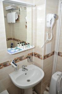 Ванна кімната в Kontinent Hotel