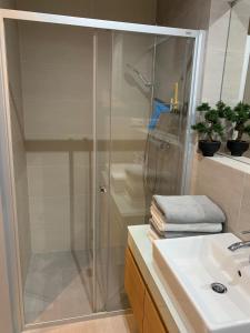 a bathroom with a shower and a sink at Apartmán Jestřáb Janské Lázně in Janske Lazne