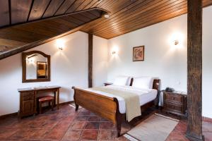Postel nebo postele na pokoji v ubytování Chateau Purcari