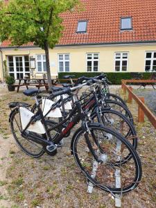 a group of bikes parked in front of a house at Danhostel Ringsted in Ringsted
