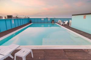 a swimming pool on top of a building at Hotel Elite Cattolica in Cattolica