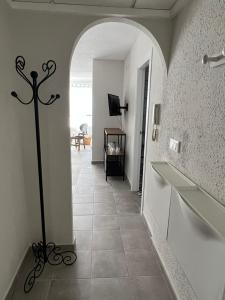 Телевизор и/или развлекательный центр в Apartamentos La Mar