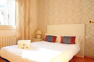 Posteľ alebo postele v izbe v ubytovaní Bcn-rentals apartments in the Old town