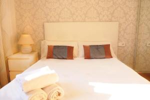 Posteľ alebo postele v izbe v ubytovaní Bcn-rentals apartments in the Old town