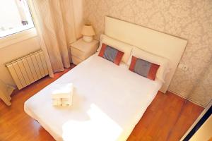 Posteľ alebo postele v izbe v ubytovaní Bcn-rentals apartments in the Old town