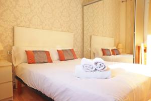 Posteľ alebo postele v izbe v ubytovaní Bcn-rentals apartments in the Old town
