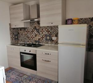Kuchyň nebo kuchyňský kout v ubytování casa teresa