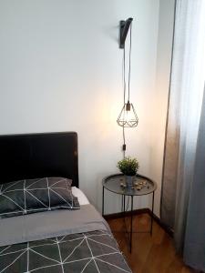 Postel nebo postele na pokoji v ubytování Residensi Flora