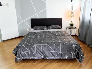 Postel nebo postele na pokoji v ubytování Residensi Flora