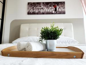 Postel nebo postele na pokoji v ubytování Residensi Flora
