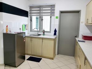 Kuchyň nebo kuchyňský kout v ubytování Residensi Flora