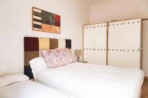 Posteľ alebo postele v izbe v ubytovaní Bcn-rentals apartments in the Old town