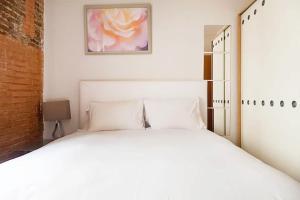 Posteľ alebo postele v izbe v ubytovaní Bcn-rentals apartments in the Old town