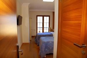 A bed or beds in a room at Miletus Otel Şile