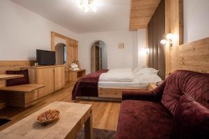 Postel nebo postele na pokoji v ubytování Hotel Gran Paradis