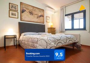 Cama o camas de una habitación en Under The Tuscan Sun