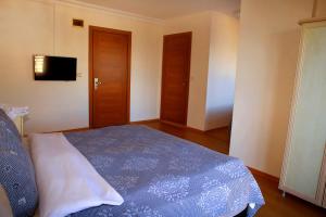 A bed or beds in a room at Miletus Otel Şile