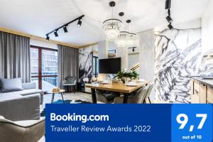 Televízia a/alebo spoločenská miestnosť v ubytovaní Apartament SKI
