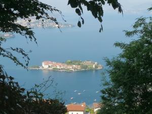 a view of a large body of water with a town at La Casetta in Stresa