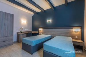 Postel nebo postele na pokoji v ubytování No. 31 in Valletta + 11 fotografií