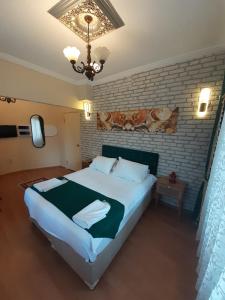 Postel nebo postele na pokoji v ubytování Stone Home Apart